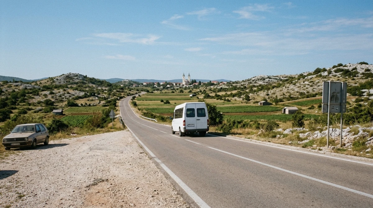 A coach on the coastal road toward Medjugorje with the Herzegovina hills in the background